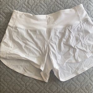 Gently used lululemon white running shorts!